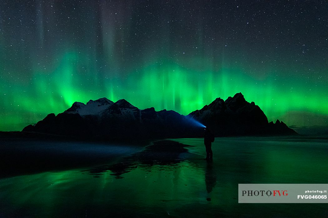 Aurora borealis, view towards Vestrahorn Mountain near Hfn, Cape Stokksnes, Stokksnes, Iceland, Europe
